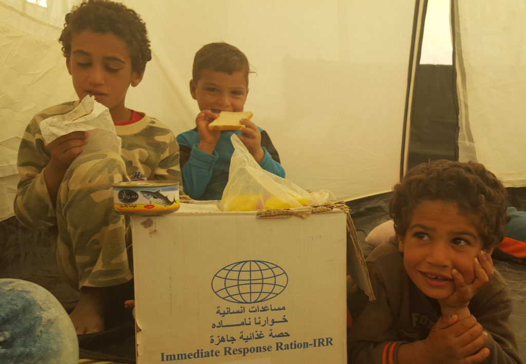 Hamood's children happy to receive an IRR package.