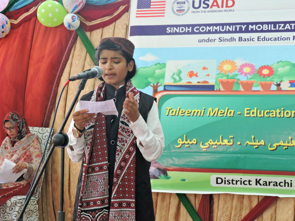 A student delivers a speech in the Education Fairs
