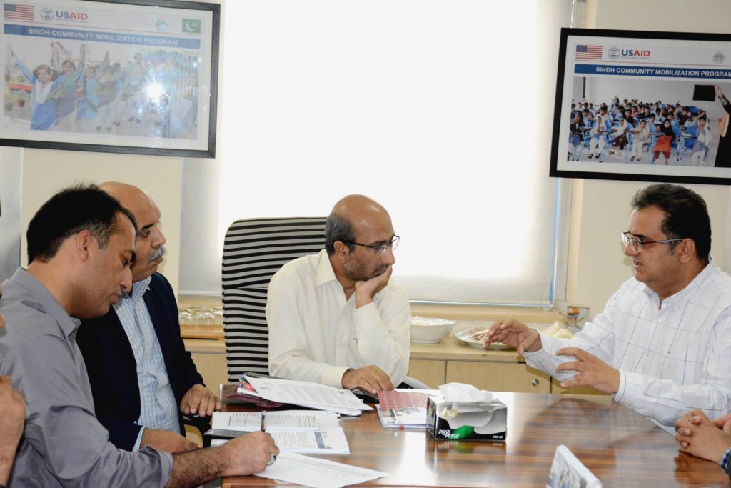 CMP's Acting Chief of Party Rafiq Mangi (right) speaks with Mr. Noor Ul Haq Baloch, Secretary Education, Government of Balochistan, about education reform