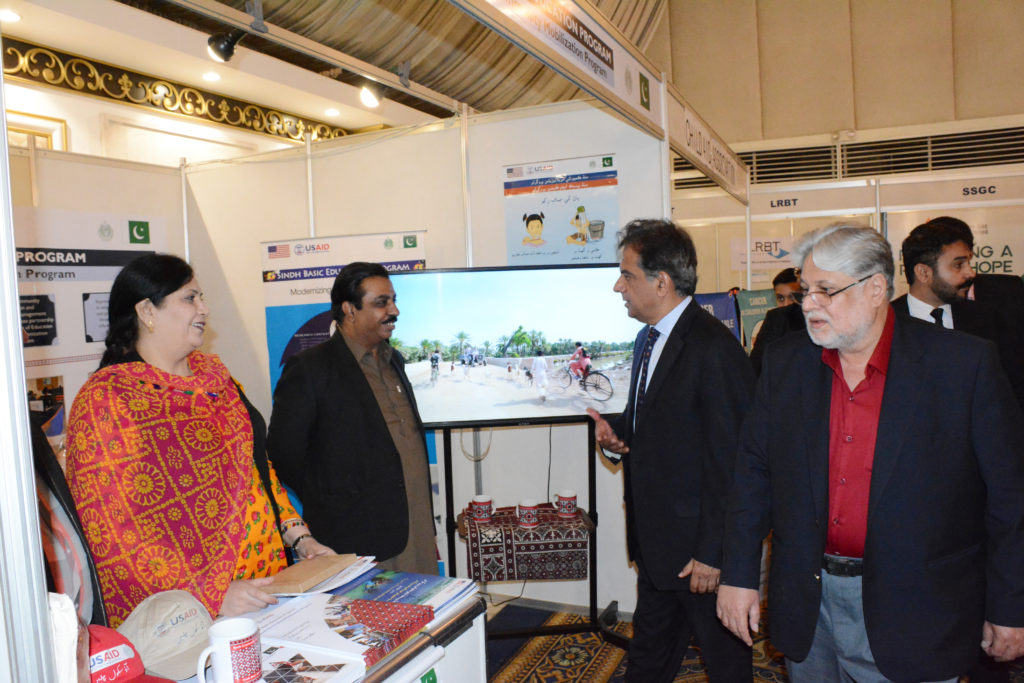 CMP staff briefing the summit participants who visited its stall at the event