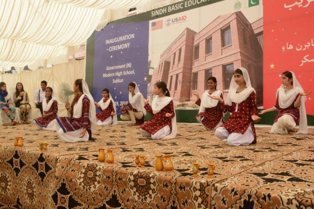 A group of students performs a cultural song at Sukkur inauguration ceremony