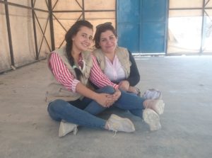 Maya, left, Site Engineer in Syria