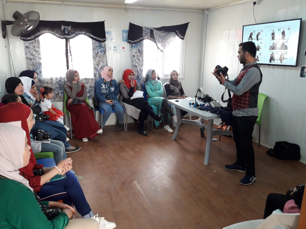 Shawkat teaching a class in Zaatari Camp